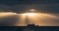 Oil tanker ship in the ocean. Sunset sky. Royalty Free Stock Photo