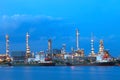 Oil tanker ship on port against beautiful lighting in dusky sky Royalty Free Stock Photo