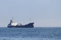 Oil tanker ship sailing in the ocean in sunny day, calm blue sea. Royalty Free Stock Photo