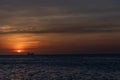 Oil tanker ship at sunset in the sea Royalty Free Stock Photo