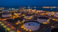 Oil terminal is industrial facility for storage of oil and petrochemical products ready for transport to further storage Royalty Free Stock Photo