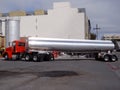 Oil Truck unloads gasoline into station Royalty Free Stock Photo