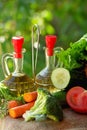 Oil vinegar and vegetables. Royalty Free Stock Photo