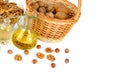 Oil of walnut and hazelnut, nutfruit isolated on white background. Royalty Free Stock Photo