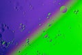 Oil on water flat colorful duotone macro abstract background photographic image.