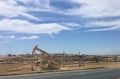 An oil well pumps crude out of the fields, California