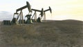 Oil wells seamless loop - oil pumps on meadow