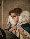 Italy. Artistic heritage. Nativity, work by Master of Bolea. Detail with a shepherd than carries a sheep on shoulders Royalty Free Stock Photo