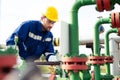Oil worker is checking the oil pump Royalty Free Stock Photo