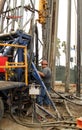 Oil Worker at Oil Well Abandoning Jobsite Royalty Free Stock Photo