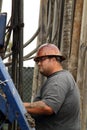 Oil Worker at Oil Well Abandoning Jobsite Royalty Free Stock Photo