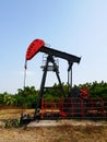 Oilfield Pump jack rocking horse or pumpjack over a wellhead Royalty Free Stock Photo