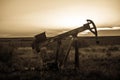 Oilfield Pump Jack at Sunset Royalty Free Stock Photo