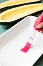 Oiling dish before cooking zucchini