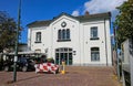 Beautiful historic dutch white old ancient train station building