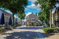 Street view of dutch picturesque town with old post office used as book store
