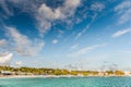 OISTINS, BARBADOS - MARCH 15, 2014: Miami Beach Landscape with Ocean Water Blue Sky and Local Restaurants