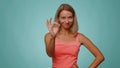 Woman looking approvingly, showing ok approve feedback gesture like sign positive something good Royalty Free Stock Photo