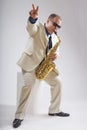 Saxophonist Caucasian soloist plays the saxophone Royalty Free Stock Photo