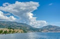 Okanagan lake and mountains overview on cloudy sky background