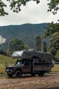 Okatse, Georgia - August 10, 2021: A Mercedes-Benz gelendvagen off-road vehicle has been converted into a mobile home, van,