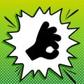 Okay. Hand icon. Black Icon on white popart Splash at green background with white spots. Illustration