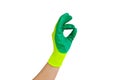 Okay hand sign. Male hand in green glove for working in the garden, vegetable garden isolated on white background. Worker showing Royalty Free Stock Photo