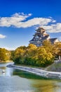 Okayama Crow Castle or Ujo Castle in Okayama City on the Asahi River in Japan. With Little Boat In Foreground