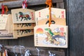 Traditional wooden prayer tablet Ema at Achi Shrine in Kurashiki, Okayama, Japan. Shrines have a