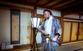 Tourists dressed into the Beautiful National Kimono in the Japanese Castle