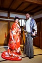 Tourists dressed into the Beautiful National Kimono in the Japanese Castle