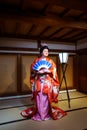 Tourists dressed into the Beautiful National Kimono in the Japanese Castle