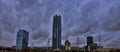 OKC as the sky dims with the Devon energy center and downtown skyline beginning to light up