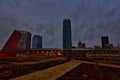 OKC as the sky dims with the Devon energy center and downtown skyline beginning to light up