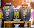 OKINAWA, JAPAN - AUGUST 18, 2018: Two Jar or or Bottles of Sake Royalty Free Stock Photo