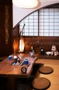 Okinawa style dinning room with shibori table cloth and ceramic Royalty Free Stock Photo