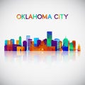 Oklahoma City skyline silhouette in colorful geometric style.