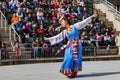 Sunny view of a woman dancer doing Chinese style dance