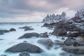 Okneset and Ersfjord from Tungeneset on a stormy day with breaking waves and spray. Sunny day in Mountains And Fjords, Winter Royalty Free Stock Photo