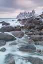 Okneset and Ersfjord from Tungeneset on a stormy day with breaking waves and spray. Sunny day in Mountains And Fjords, Winter