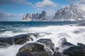 Okneset and Ersfjord from Tungeneset on a stormy day with breaking waves and spray. Sunny day in Mountains And Fjords, Winter