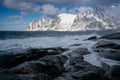 Okneset and Ersfjord from Tungeneset on a stormy day with breaking waves and spray. Sunny day in Mountains And Fjords, Winter