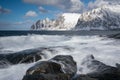 Okneset and Ersfjord from Tungeneset on a stormy day with breaking waves and spray. Sunny day in Mountains And Fjords, Winter