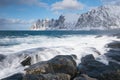 Okneset and Ersfjord from Tungeneset on a stormy day with breaking waves and spray. Sunny day in Mountains And Fjords, Winter