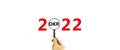 2022 OKR, objectives and key results new year symbol. Businessman holds magnifying glass with words 2022 OKR on beautiful white