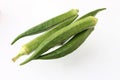 Okra fresh and green, isolated - ladies finger - Abelmoschus esculentus Royalty Free Stock Photo