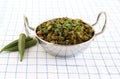 Okra Stir Fry or Lady`s Finger Curry in a Steel Wok