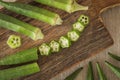 Okra. Vegeteble on a kitchen board, partly chopped