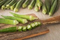 Okra. Vegeteble on a kitchen board, partly chopped