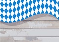 Oktoberfest background with bavarian white blue cloth and wooden board, copy space, text place. Bavaria State flag